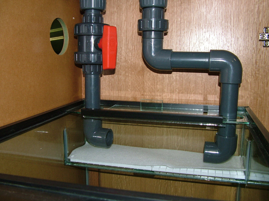 Marine sump outlet tank